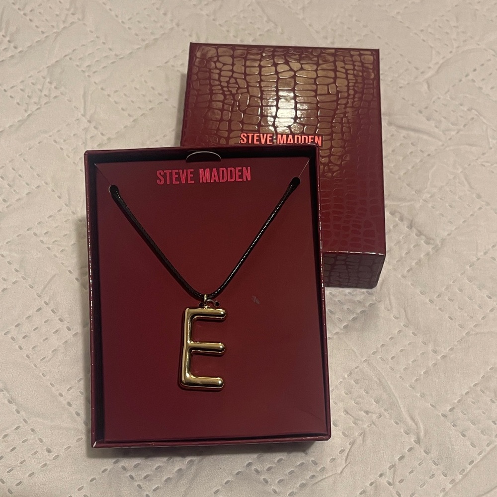 Steve Madden “E” Pendant Necklace w/ sleek black cord.